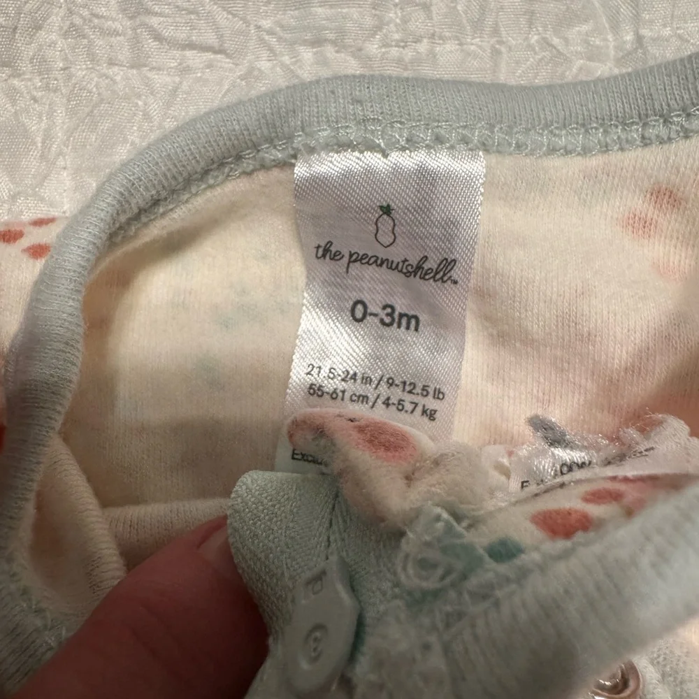 The peanutshell  0-3 months  set of 2 One Pieces Set - Floral and Animal Prints